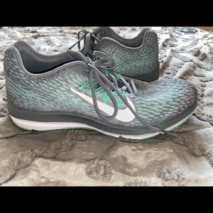 Grey and teal women’s nikes